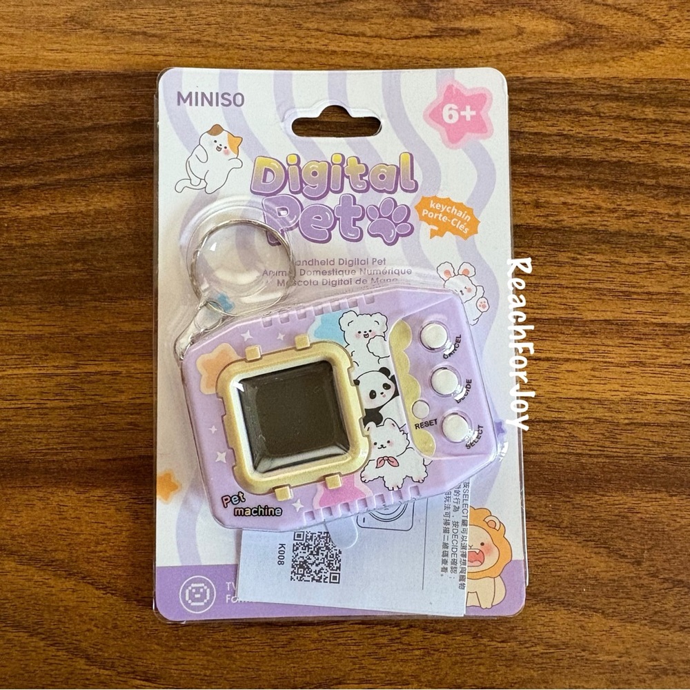 Miniso Digital Pet Machine Virtual Mini Pet Purple Tv Shaped Handheld